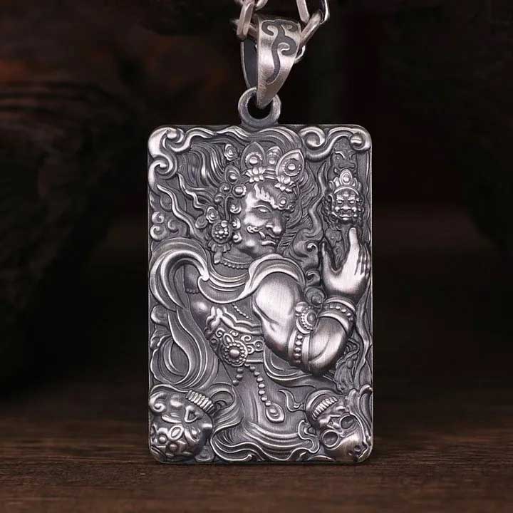 A rectangular pendant depicting Acala (Fudo Myo-o)