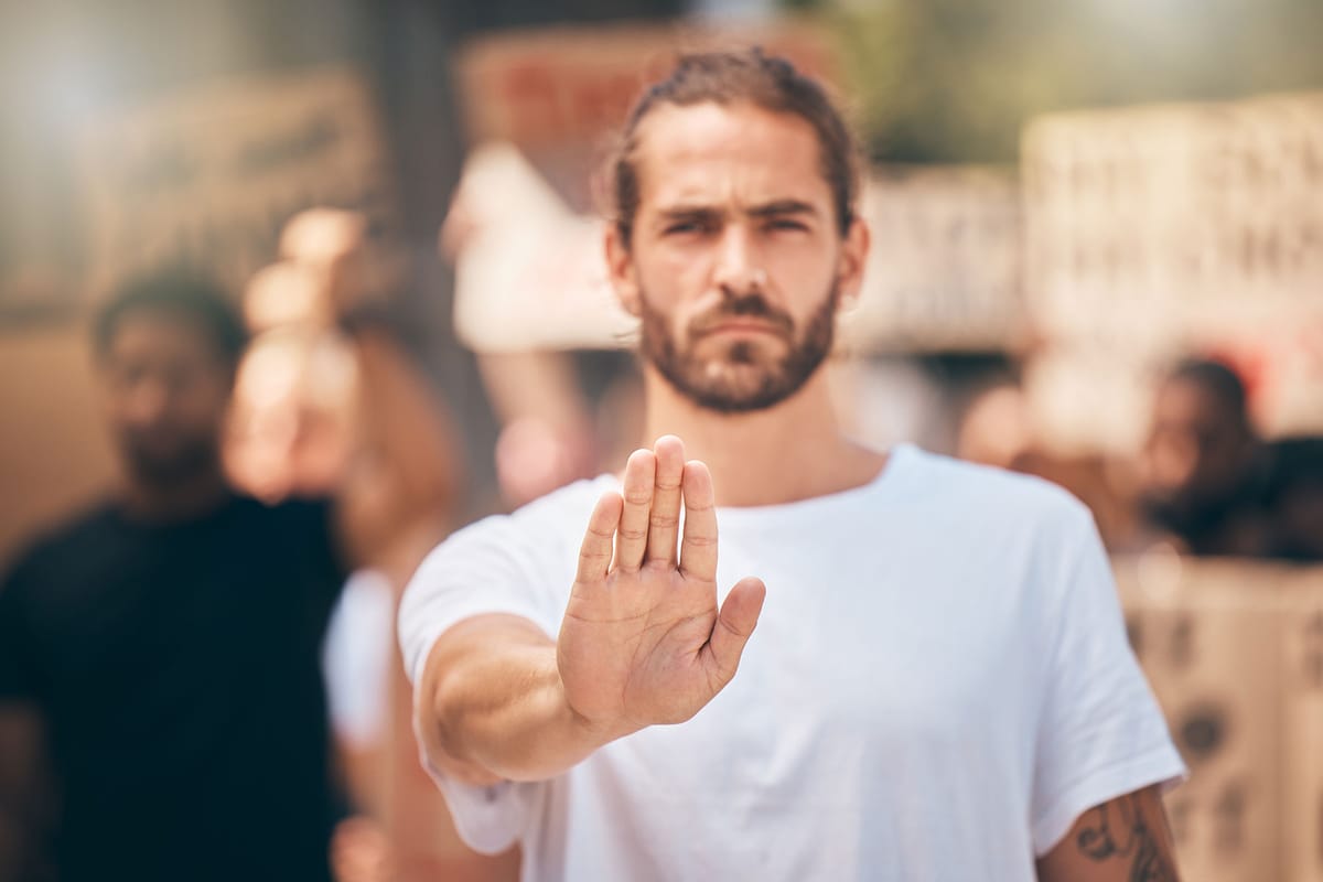 Man holding out the palm of his hand